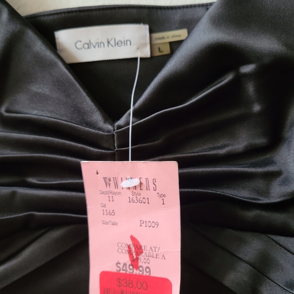 Size L - Calvin Klein dressy black satin top with nice detail at mid chest - Picture 3 of 3